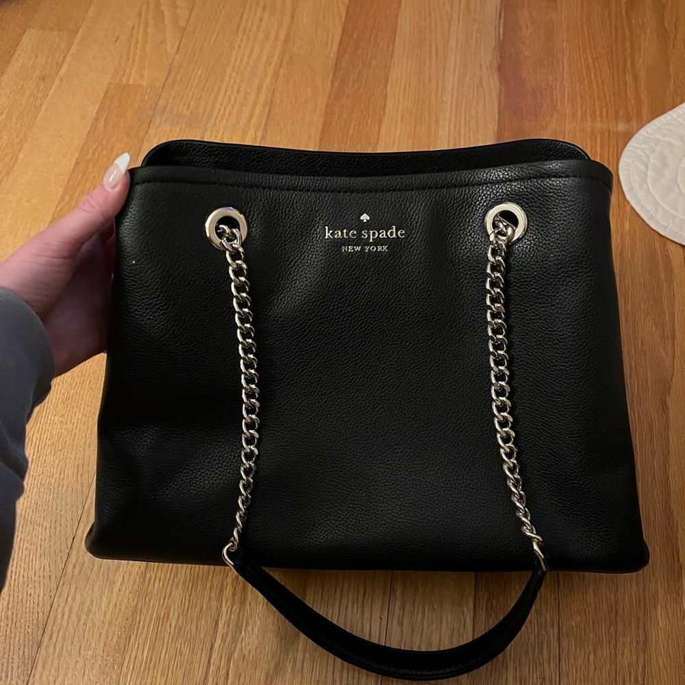 Kate spade purse, a year old barley used.